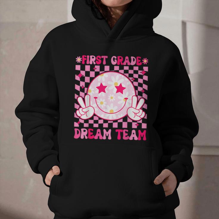 Groovy First Grade Dream Team Back To School 1st Grade Squad Graphic Youth Hoodie Groovy First Grade Dream Team Back To School 1st Grade Squad Graphic Youth Hoodie