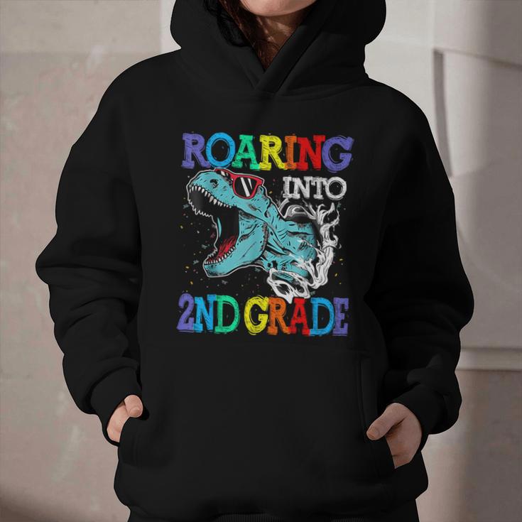 Roaring Into 2Nd Grade DinosaurRex Back To School Graphic Youth Hoodie Roaring Into 2Nd Grade DinosaurRex Back To School Graphic Youth Hoodie