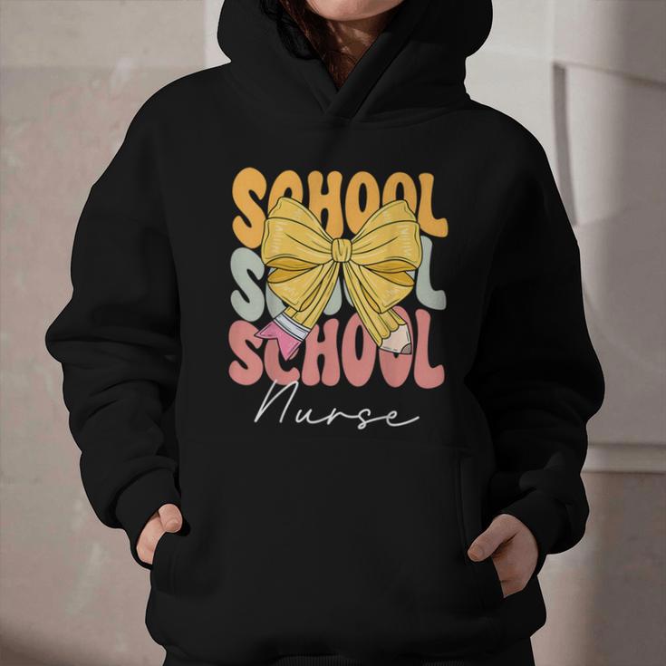 School Nurse Groovy Coquette Bow Cute Back To School Graphic Youth Hoodie