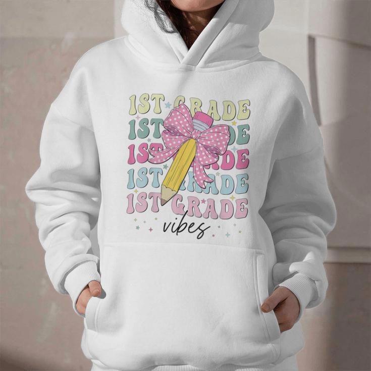 1st Grade Vibes Girl Coquette Bow First Grade Back To School Graphic Youth Hoodie 1st Grade Vibes Girl Coquette Bow First Grade Back To School Graphic Youth Hoodie