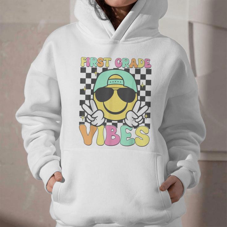 1st Grade Vibes Smile Face Back To School First Grade Graphic Youth Hoodie 1st Grade Vibes Smile Face Back To School First Grade Graphic Youth Hoodie
