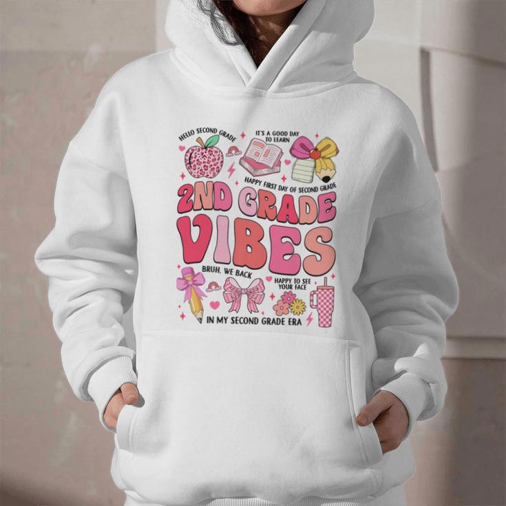 Girls 2nd Grade Vibes Coquette Pink Bow Back To School Graphic Youth Hoodie Girls 2nd Grade Vibes Coquette Pink Bow Back To School Graphic Youth Hoodie