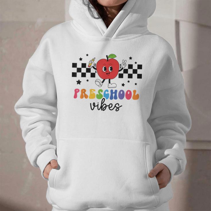 Preschool Vibes Retro Groovy Apple Back To School Graphic Youth Hoodie Preschool Vibes Retro Groovy Apple Back To School Graphic Youth Hoodie