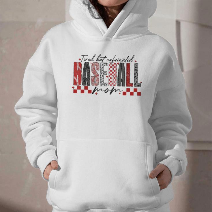 Retro Checkered Tired But Caffeinated Baseball Mom Leopard Graphic Youth Hoodie Retro Checkered Tired But Caffeinated Baseball Mom Leopard Graphic Youth Hoodie