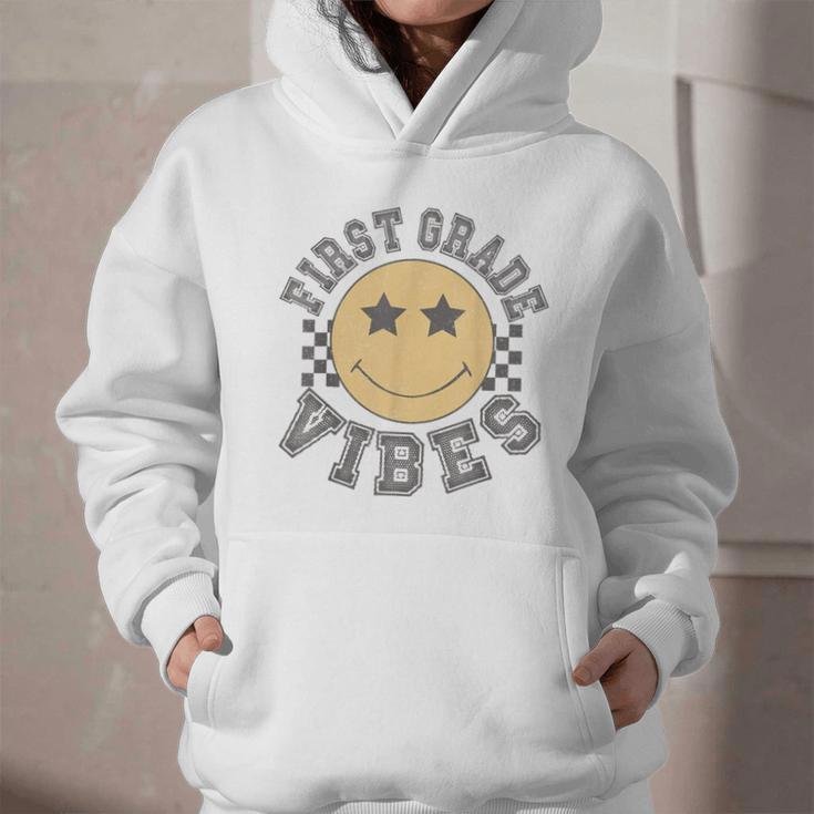 Retro First Grade Vibes Smile Face Back To School 1st Grade Graphic Youth Hoodie Retro First Grade Vibes Smile Face Back To School 1st Grade Graphic Youth Hoodie