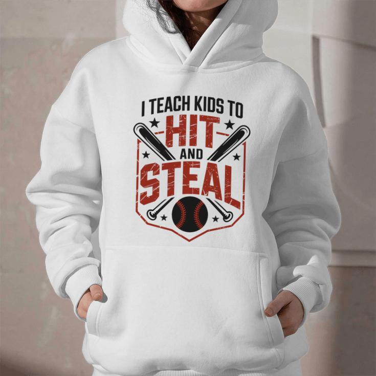 I Teach Kids To Hit And Steal Baseball Softball Coach Premium Tri-Blend Graphic Youth Hoodie I Teach Kids To Hit And Steal Baseball Softball Coach Premium Tri-Blend Graphic Youth Hoodie