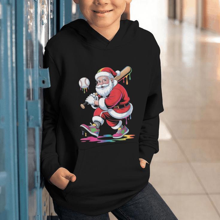 Baseball Christmas Santa Claus Batter Baseball Drip Graphic Youth Hoodie Baseball Christmas Santa Claus Batter Baseball Drip Graphic Youth Hoodie
