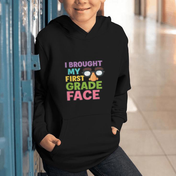 I Brought My First Grade Face First Day Back To School Graphic Youth Hoodie I Brought My First Grade Face First Day Back To School Graphic Youth Hoodie