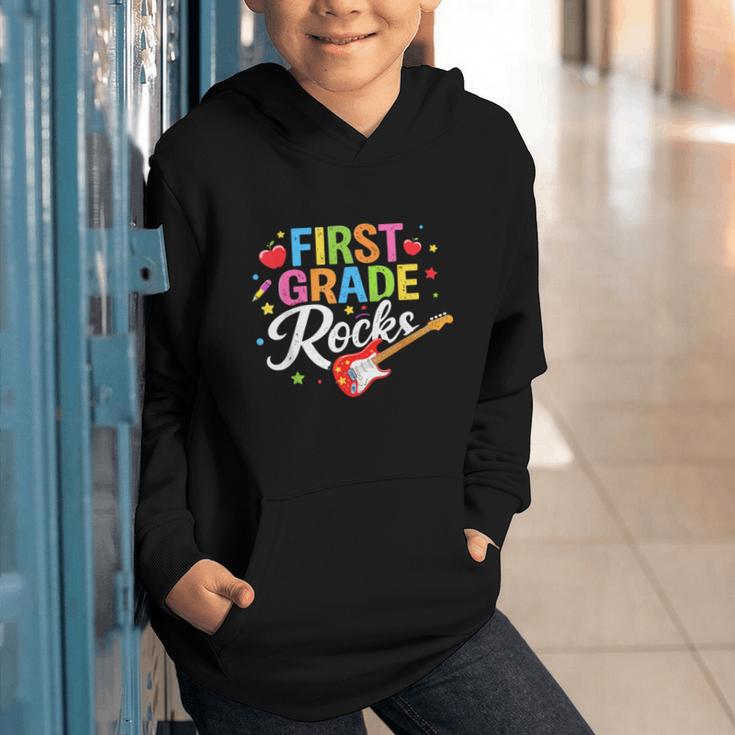 First Grade Rocks Colorful Back To School Guitar Graphic Youth Hoodie First Grade Rocks Colorful Back To School Guitar Graphic Youth Hoodie