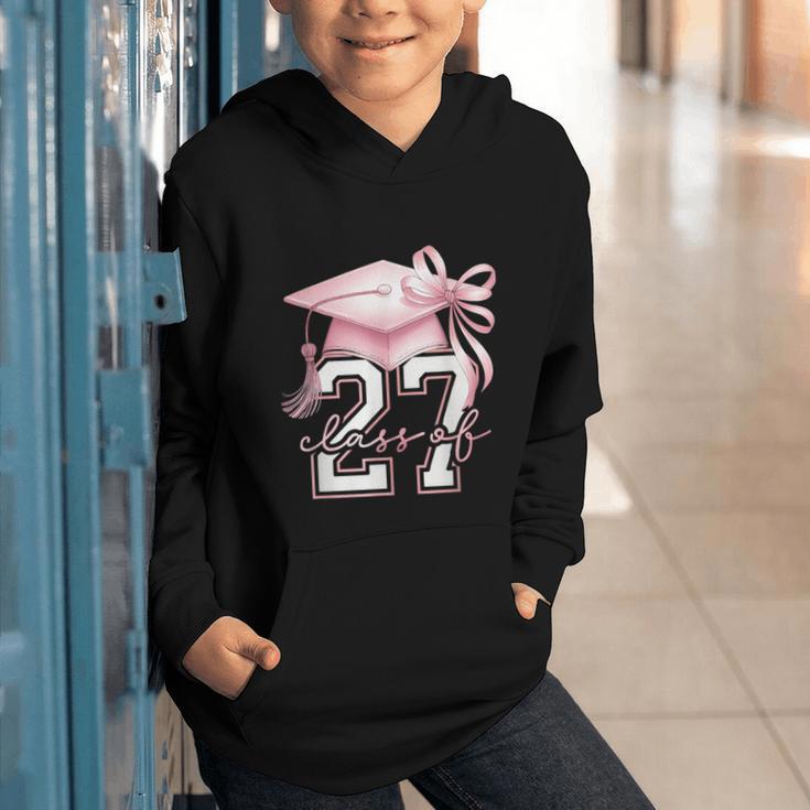 Girls Class Of 2027 Back To School Senior 2027 Coquette Bow Graphic Youth Hoodie Girls Class Of 2027 Back To School Senior 2027 Coquette Bow Graphic Youth Hoodie