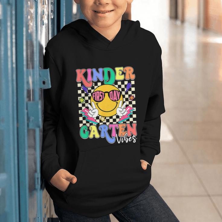 Retro Groovy Kinder Garten Vibes Smile Team Back To School Graphic Youth Hoodie Retro Groovy Kinder Garten Vibes Smile Team Back To School Graphic Youth Hoodie