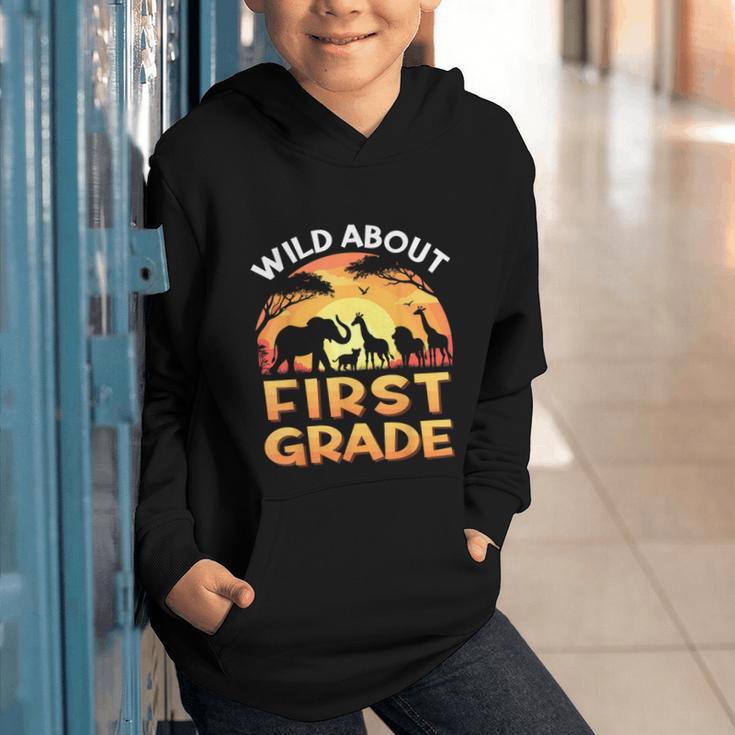 Wild About First Grade Zoo Animals Back To School Safari Graphic Youth Hoodie Wild About First Grade Zoo Animals Back To School Safari Graphic Youth Hoodie
