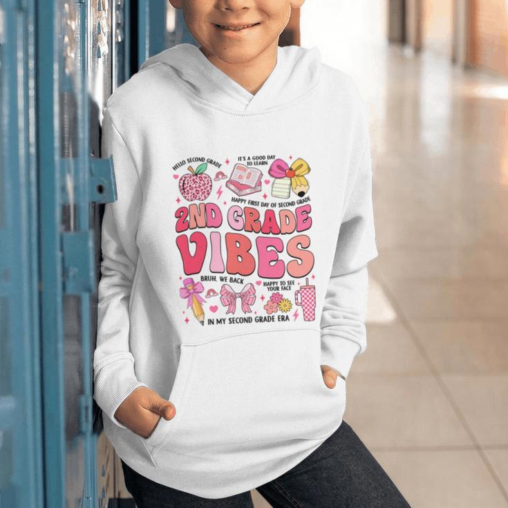 Girls 2nd Grade Vibes Coquette Pink Bow Back To School Graphic Youth Hoodie Girls 2nd Grade Vibes Coquette Pink Bow Back To School Graphic Youth Hoodie