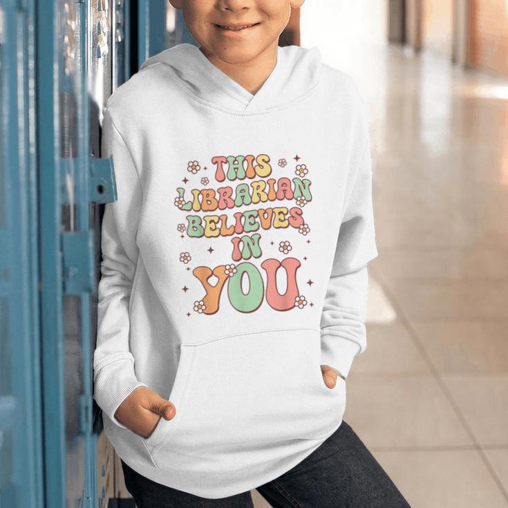 This Librarian Believes In You Groovy Back To School Graphic Youth Hoodie