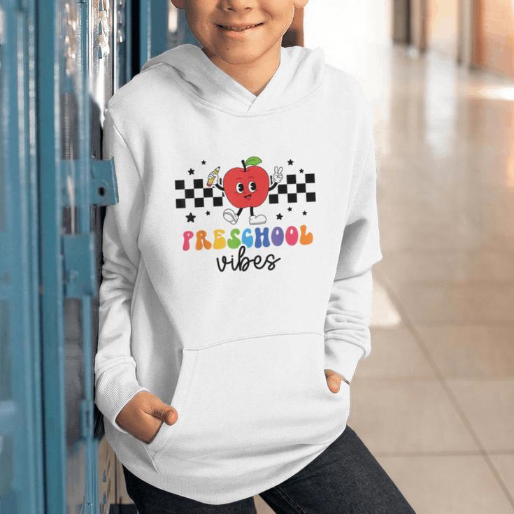 Preschool Vibes Retro Groovy Apple Back To School Graphic Youth Hoodie Preschool Vibes Retro Groovy Apple Back To School Graphic Youth Hoodie
