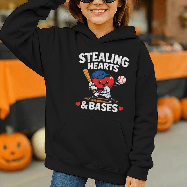 Stealing Hearts & Bases Valentine’s Day Baseball Love Graphic Youth Hoodie Stealing Hearts & Bases Valentine’s Day Baseball Love Graphic Youth Hoodie