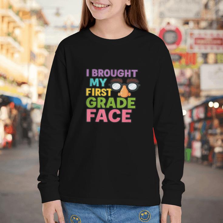I Brought My First Grade Face First Day Back To School Youth Long Sleeve Tee