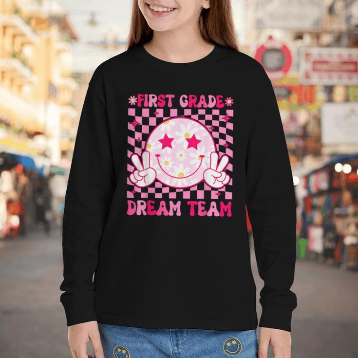 Groovy First Grade Dream Team Back To School 1st Grade Squad Youth Long Sleeve Tee Groovy First Grade Dream Team Back To School 1st Grade Squad Youth Long Sleeve Tee