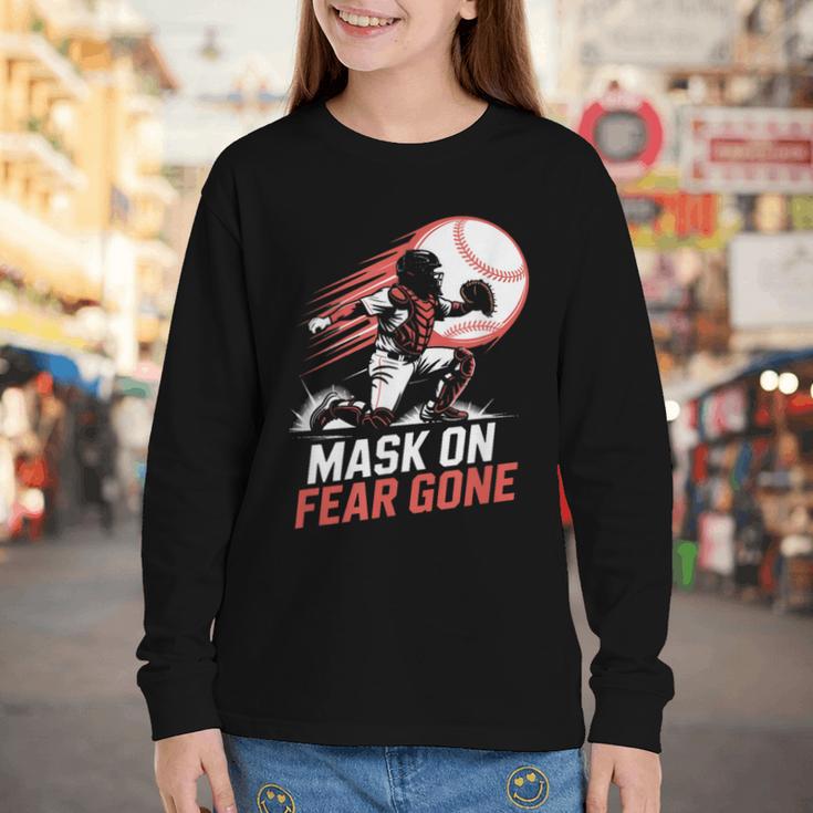 Mask On Fear Gone Baseball Catcher Softball Youth Long Sleeve Tee Mask On Fear Gone Baseball Catcher Softball Youth Long Sleeve Tee
