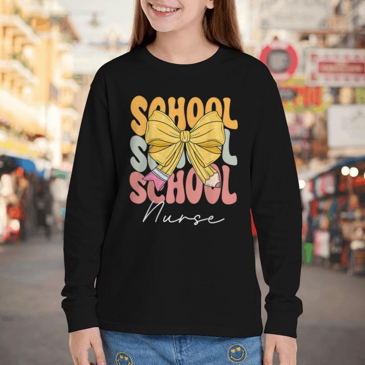 School Nurse Groovy Coquette Bow Cute Back To School Youth Long Sleeve Tee