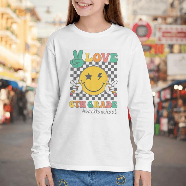 Peace Love 6th Grade Smile Face Back To School Sixth Grade Youth Long Sleeve Tee