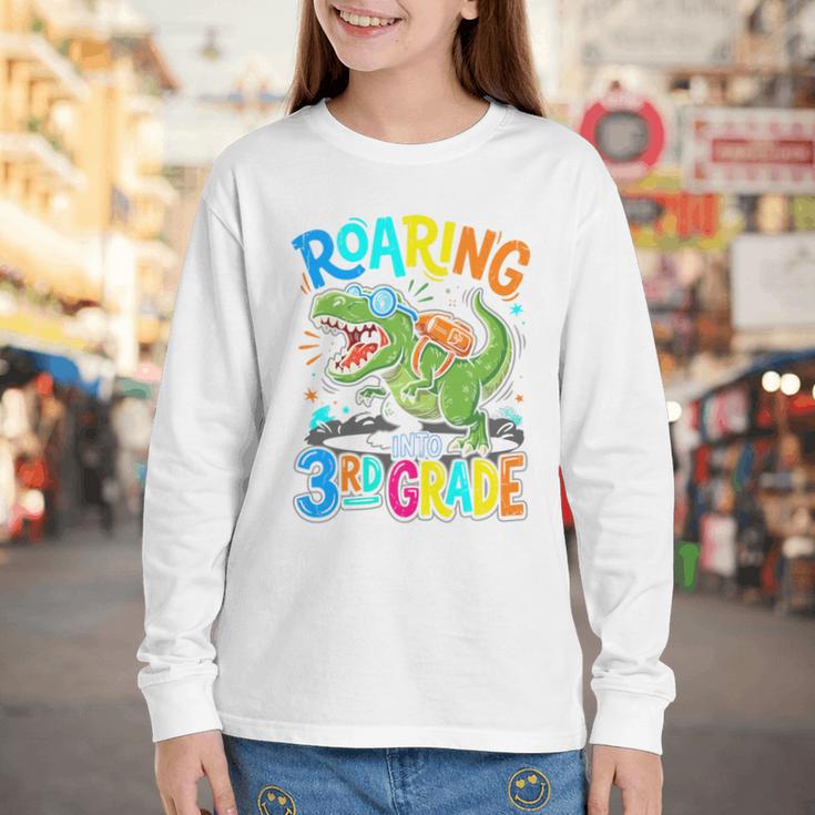 Roaring Into 3rd Grade Back To School Dinosaurus T-Rex Premium Tri-Blend Youth Long Sleeve Tee Roaring Into 3rd Grade Back To School Dinosaurus T-Rex Premium Tri-Blend Youth Long Sleeve Tee
