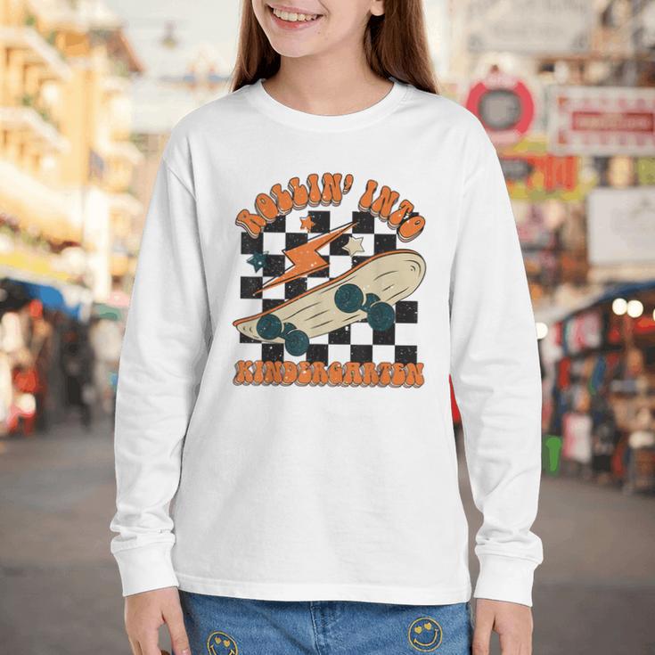 Rolling Into Kindergarten Retro Groovy Back To School Kids Youth Long Sleeve Tee Rolling Into Kindergarten Retro Groovy Back To School Kids Youth Long Sleeve Tee