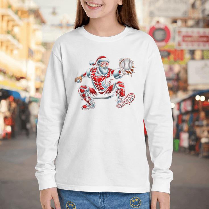 Santa Playing Baseball Catcher Merry Christmas Sport Player Youth Long Sleeve Tee Santa Playing Baseball Catcher Merry Christmas Sport Player Youth Long Sleeve Tee