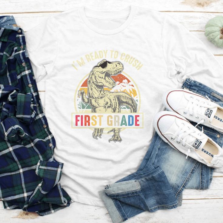 I'm Ready To Crush First Grade DinosaurRex Back To School Performance Youth Long Sleeve Tee I'm Ready To Crush First Grade DinosaurRex Back To School Performance Youth Long Sleeve Tee