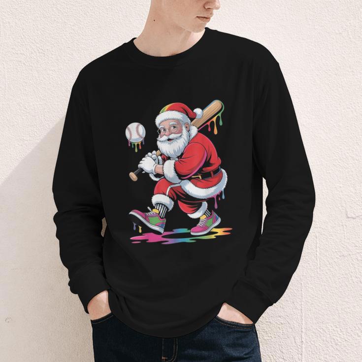 Baseball Christmas Santa Claus Batter Baseball Drip Youth Long Sleeve Tee Baseball Christmas Santa Claus Batter Baseball Drip Youth Long Sleeve Tee