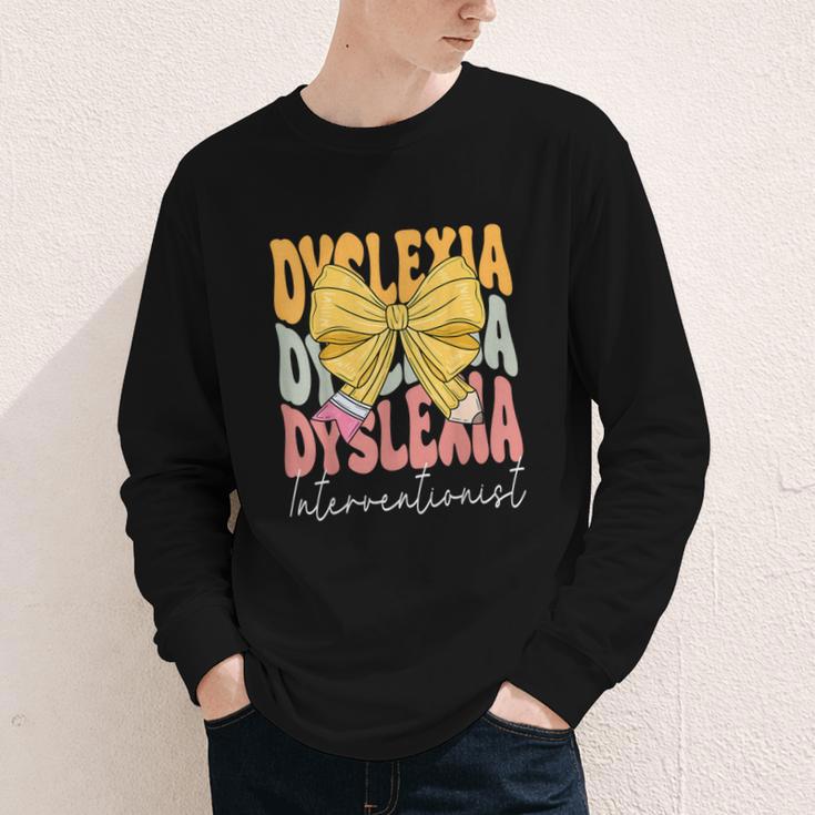 Dyslexia Interventionist Groovy Coquette Bow Back To School Youth Long Sleeve Tee Dyslexia Interventionist Groovy Coquette Bow Back To School Youth Long Sleeve Tee