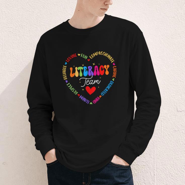 Groovy Literacy Team Reading Appreciation Back To School Youth Long Sleeve Tee