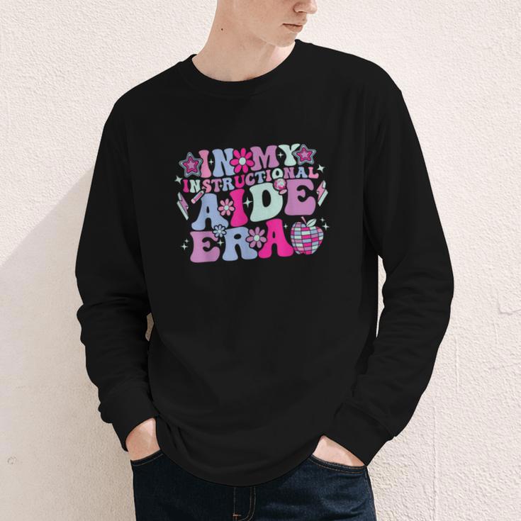 In My Instructional Aide Era Groovy Back To School Youth Long Sleeve Tee