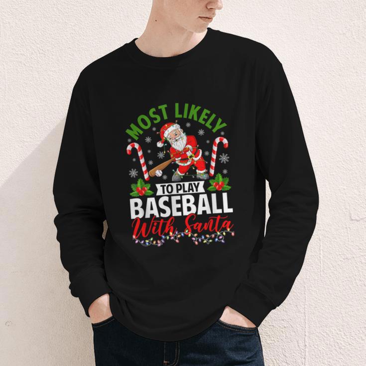 Most Likely To Play Baseball With Santa Christmas Pajamas Youth Long Sleeve Tee Most Likely To Play Baseball With Santa Christmas Pajamas Youth Long Sleeve Tee