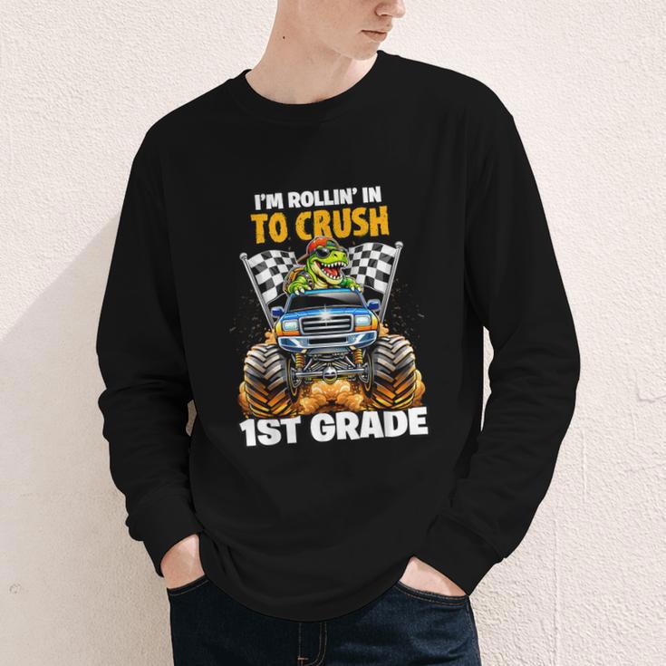 Rollin Crush Dinosaur Monster Truck Back To School 1st Grade Youth Long Sleeve Tee Rollin Crush Dinosaur Monster Truck Back To School 1st Grade Youth Long Sleeve Tee