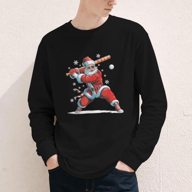 Santa Playing Baseball Christmas Candy Cane Fun Xmas Holiday Youth Long Sleeve Tee Santa Playing Baseball Christmas Candy Cane Fun Xmas Holiday Youth Long Sleeve Tee
