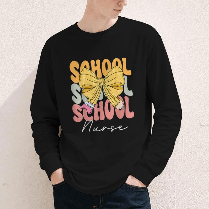 School Nurse Groovy Coquette Bow Cute Back To School Youth Long Sleeve Tee