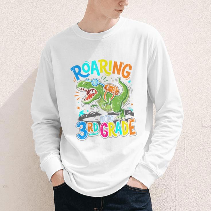 Roaring Into 3rd Grade Back To School Dinosaurus T-Rex Premium Tri-Blend Youth Long Sleeve Tee Roaring Into 3rd Grade Back To School Dinosaurus T-Rex Premium Tri-Blend Youth Long Sleeve Tee