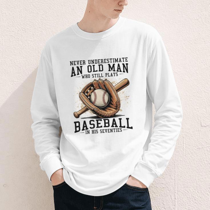 Never Underestimate Old Man Plays Baseball In His Seventies Youth Long Sleeve Tee Never Underestimate Old Man Plays Baseball In His Seventies Youth Long Sleeve Tee