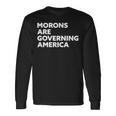 Morons Are Governing America 長袖Tシャツ ギフトのアイデア