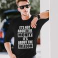 It's Not About Money It's About Freedom お金ではなく、自由を手に入れるために 長袖Tシャツ 彼への贈り物
