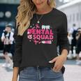 デンタルスクワッド 歯ピンクリボン 乳がん啓発 長袖Tシャツ 彼女への贈り物