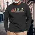 The Evolution Of Man アメリカンフットボール選手 長袖Tシャツ 高齢者への贈り物