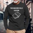 This Machine Kills Fascism 本読書 反トランプ 長袖Tシャツ 高齢者への贈り物