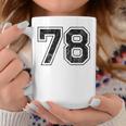 背中に78番。 コーヒーマグ 面白い贈り物