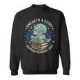 Unearth A Story Summer Reading 2026 Cute Dinosaur Reading Sweatshirt