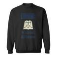 Women's We Judge Books And Their Covers Sweatshirt