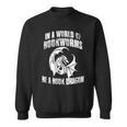 In A World Of Bookworms Be A Book Dragon Inspirational Sweatshirt