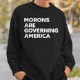 Morons Are Governing America スウェットシャツ 彼への贈り物