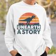 Unearth A Story Dinosaur Reader Book Lover 2026 Sweatshirt Gifts for Him